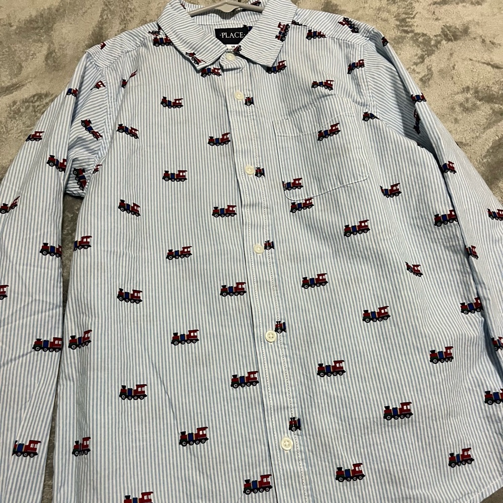 Never worn Children’s Place boys size 14 button down striped shirt with trains